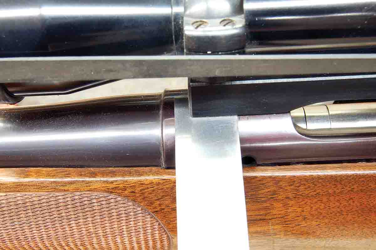 A Springfield ’03 receiver ring has been “aggressively polished.” The front base allows a piece of .010-inch shim stock to slide underneath.